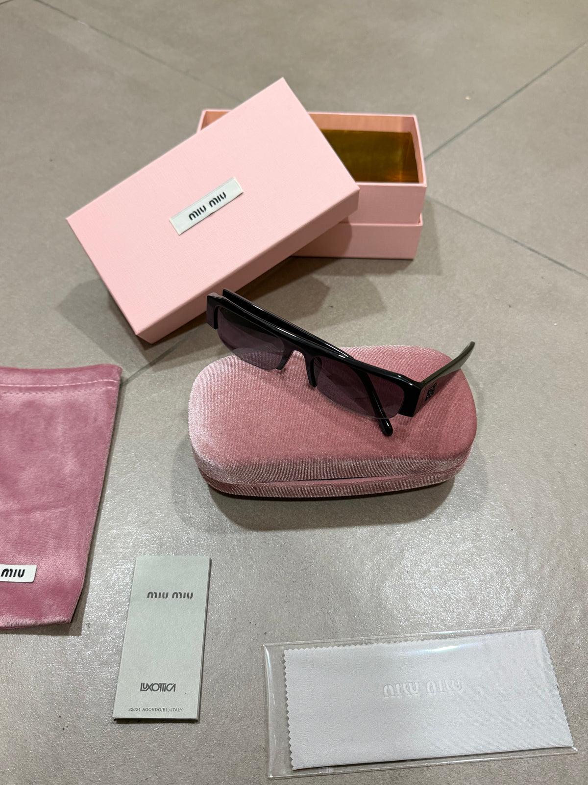 OCCHIALI DA SOLE MIU MIU